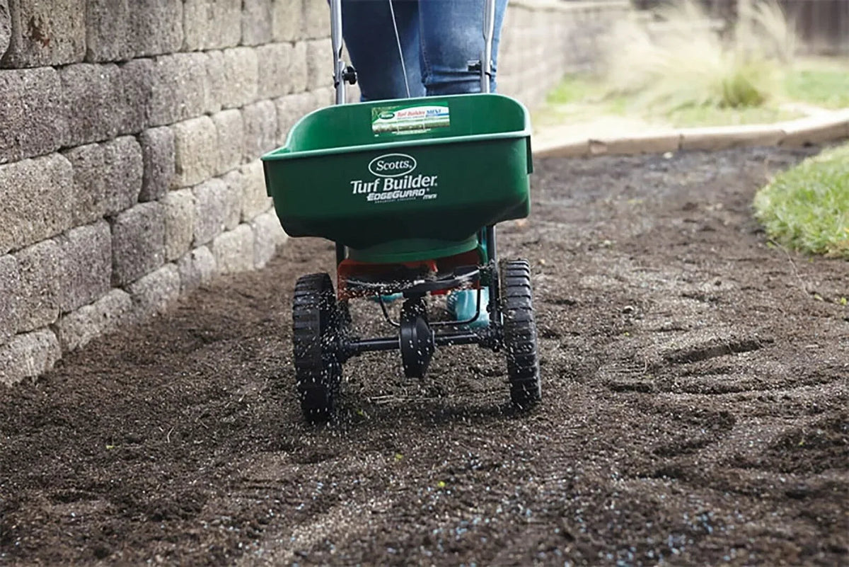 Scotts Turf Builder EdgeGuard Mini Broadcast Spreader - 5,000 Sq. Ft.